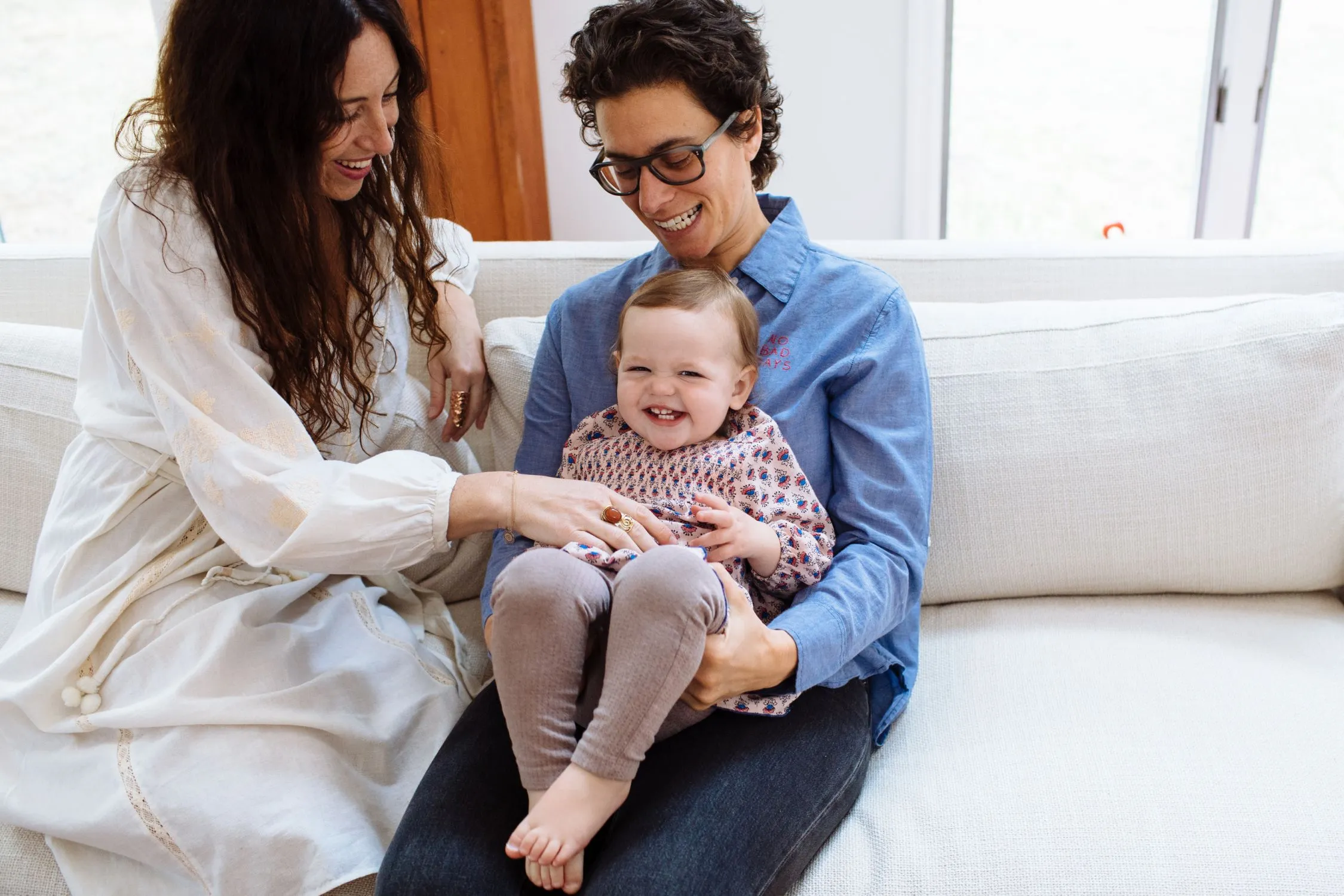 Happy family moment on sofa