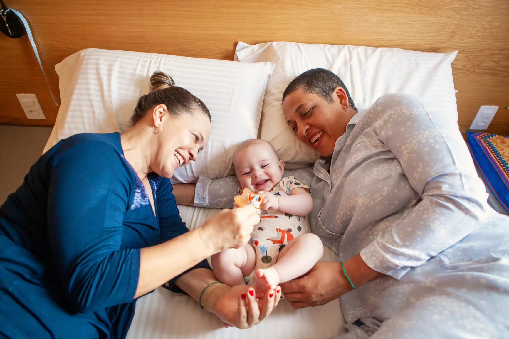Lesbian moms with baby after fertility treatment